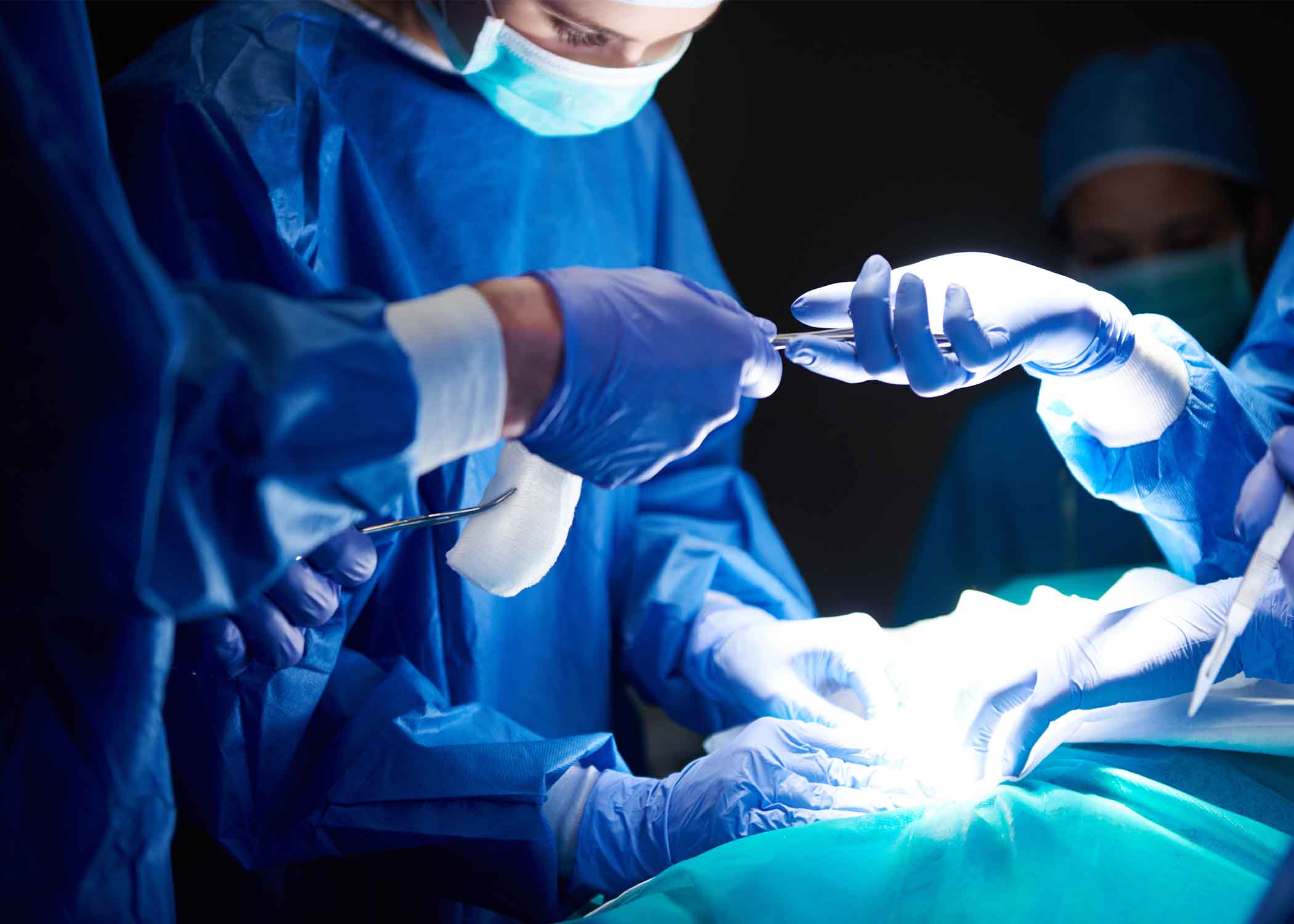 Orthopedic surgeon performing surgery for bone and joint injuries